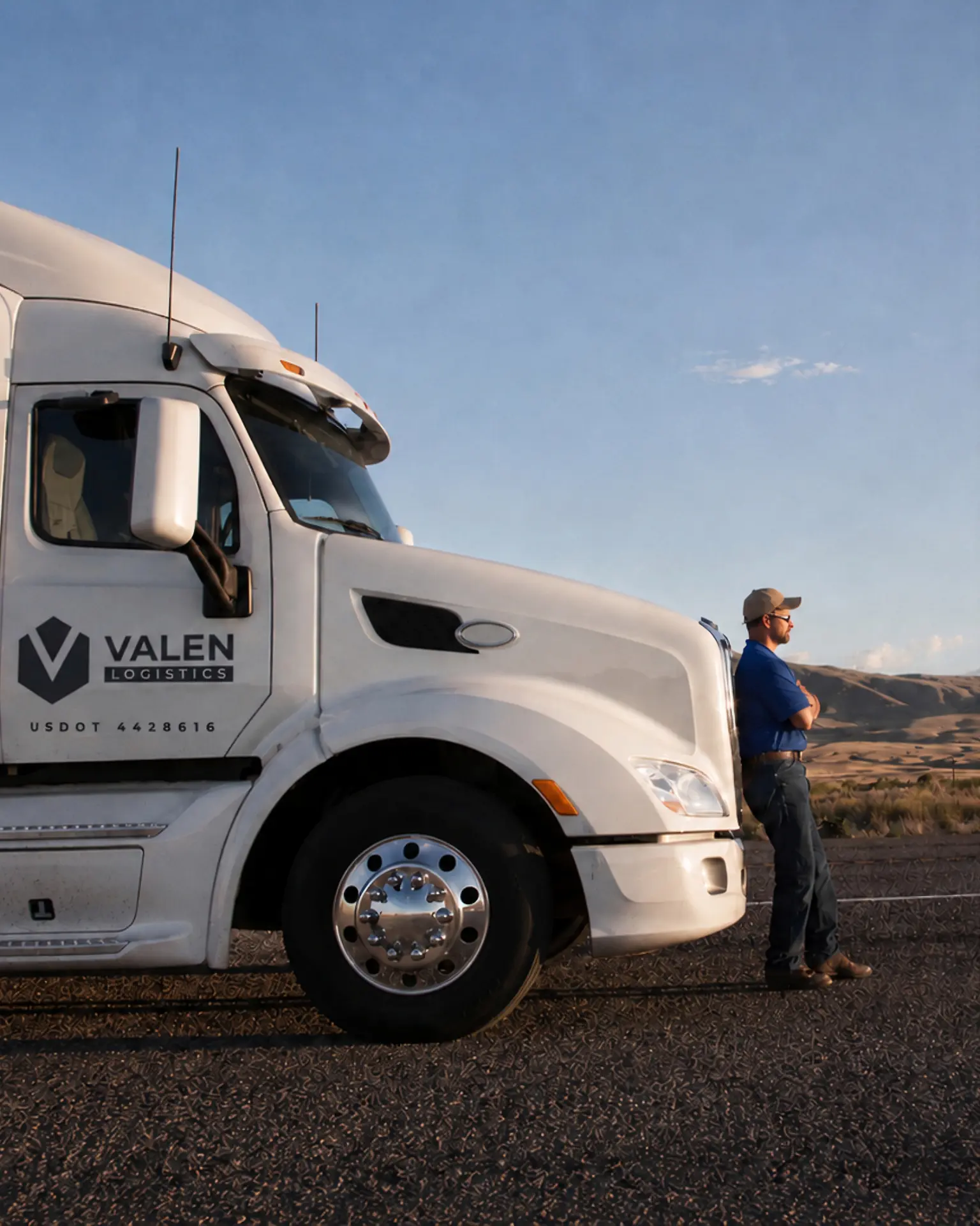 Driver at the wheel of a Valen Logistics dry van